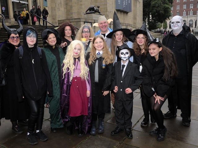 Halloween characters from the CluedUpp game of Witchcraft and Wizardry Murder by Magic where participants had to solve a murder mystery by using their phones as they hunt round Leeds city centre. Pictured are some of the groups gathered on The Headrow