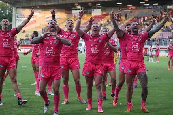 Rhinos celebrate their epic comeback win at Catalans last month. Picture by Manuel Blondeau/SWpix.com.