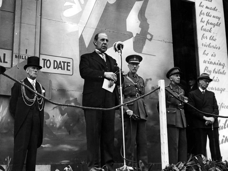 Opening ceremony for Salute the Soldier Week, making a speech is Sir John Anderton MP, who was then Chancellor of the Exchequer. On the left, wearing a top hat is Lord Mayor Albert Hayes. To the right of Sir John is Lord Harewood, then General Sir William Backstone.