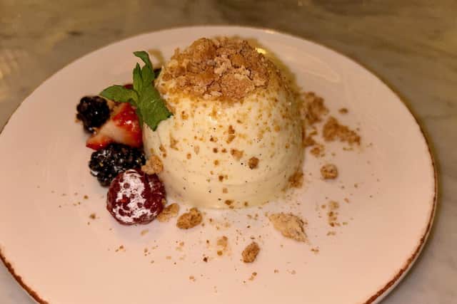 The buttermilk panna cotta, topped with summer berries, fresh mint and crushed amaretti biscuit (Photo by National World)