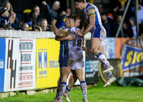 Lachie Miller celebrates with fellow off-season signings Mickael Goudemand and Paul Momirovski after scoring at Castleford Tigers. Ash Handley feels all Leeds Rhinos' recruits are making a positive impact. Picture by Allan McKenzie/SWpix.com.
