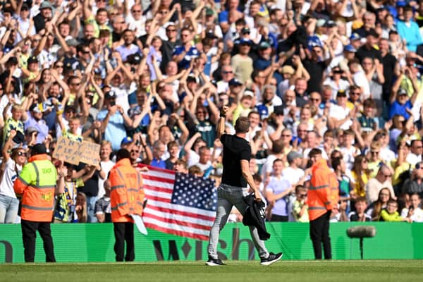 Jesse Marsch celebrates with Leeds fans after the final whistle of the Premier League match between Leeds United and Chelsea FC at Elland Road on August 21.