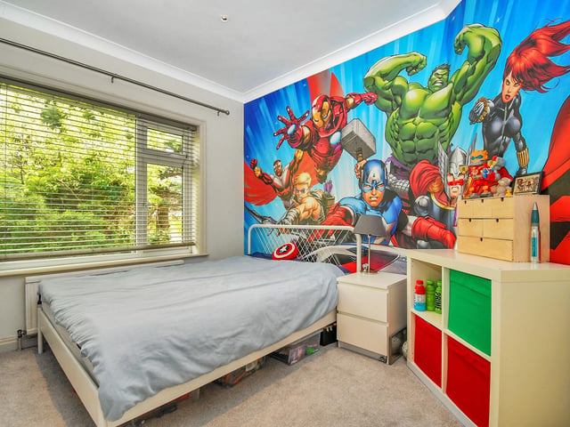 Another of the three double bedrooms.