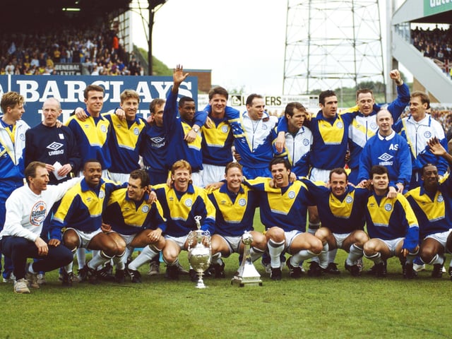 Leeds United captain Gordon Strachan (4th left front row) and manager Howard Wilkinson (left front row) celebrate First Division glory at Elland Road on May 2, 1992 in Leeds, England. (Photo by Getty Images/Getty Images)