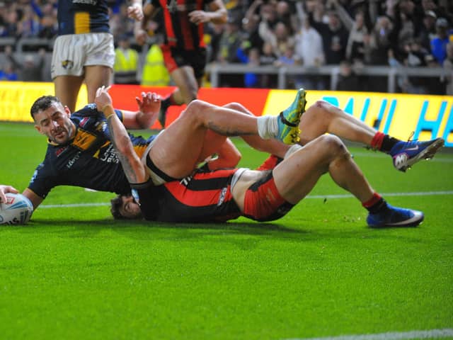 Jake Connor, seen scoring for Leeds Rhinos in their Super League semi-final loss to Warrington Wolves, has been left out of the England World Cup squad. Picture by Steve Riding.