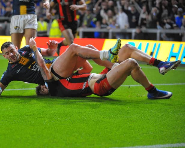 Jake Connor, seen scoring for Leeds Rhinos in their Super League semi-final loss to Warrington Wolves, has been left out of the England World Cup squad. Picture by Steve Riding.