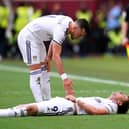 Leeds United's Patrick Bamford lies injured on the pitch during the Premier League match at the London Stadium last weekend (Pic: John Walton/PA Wire)