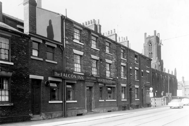 The Falcon Inn, a Tetley public house, on Great Wilson Street pictured in July 1959. To the right is the junction with Church Cross Street, then Christ Church which fronts onto Meadow Lane, at the right edge.