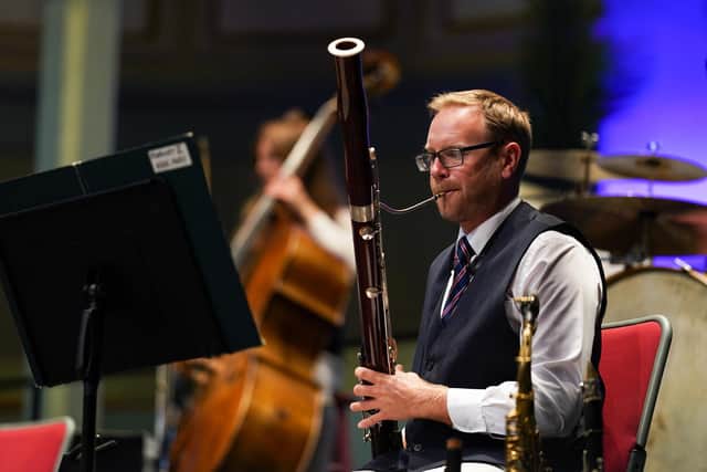 A musician from the Scarborough Spa Orchestra plays in the summer season