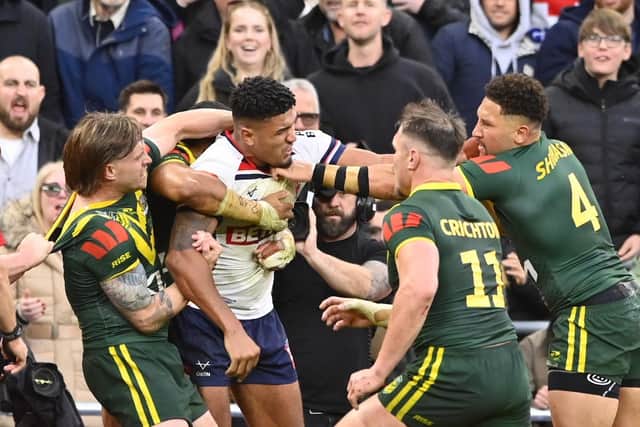 England's Kai Pearce-Paul clashes with Gehamat Shibasaki, of Australia. Picture by Allan McKenzie/SWpix.com.