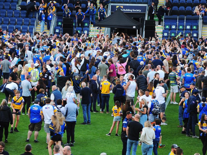 Rhinos fans were invited to party on the pitch at AMT Headingley following the win over Warrington Wolves in June.