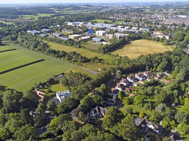 Looking over the property and its excellent location.