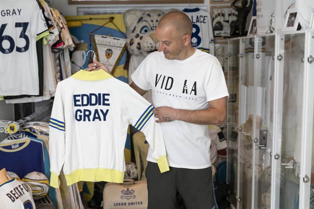 Leeds United super fan Ben Hunt holds an Eddie Gray 1974 walk out top. Photo: Lee McLean/SWNS