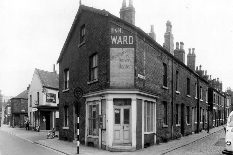 Accommodation Road is on the left, Nippet Terrace has an off-licence shop on the corner which was number 82 Accommodation Road. Next right is number 78, a greengrocers business run by E. and Harold Ward. This is the corner with Nippet Street, which is on the right.