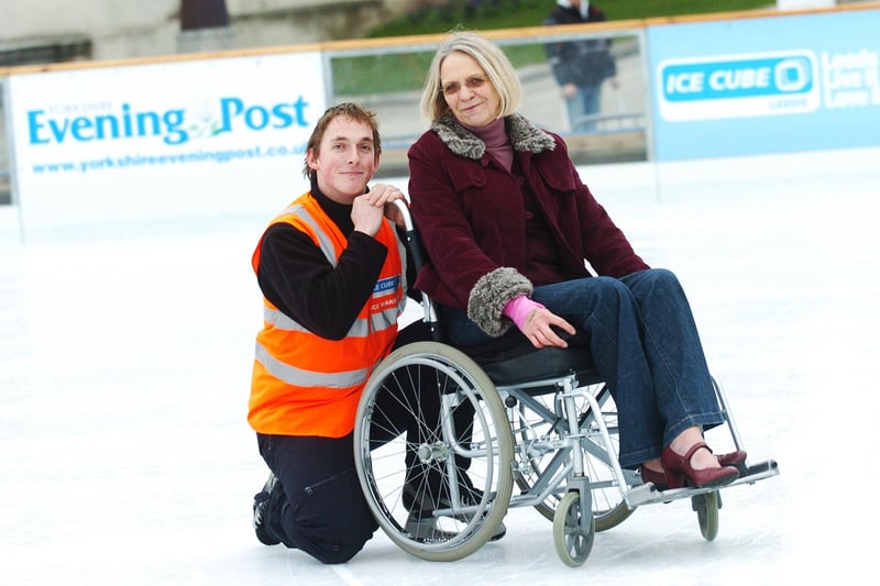 The Ice Cube at Millennium Square in January 2009. Pictured are  wheelchair user Linda Boadle and ice marshall Richard Cookson on the ice to promote a world record attempt for wheelchair ice skating.