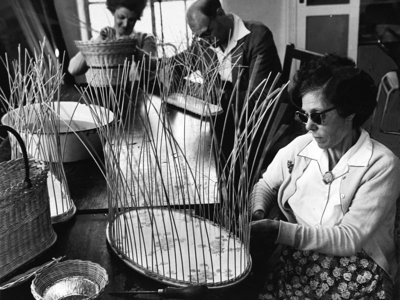 Maureen Laycock, Geoffrey Smith and Elsie Osler pictured doing basketry at St. George's House in Harrogate in July 1962.