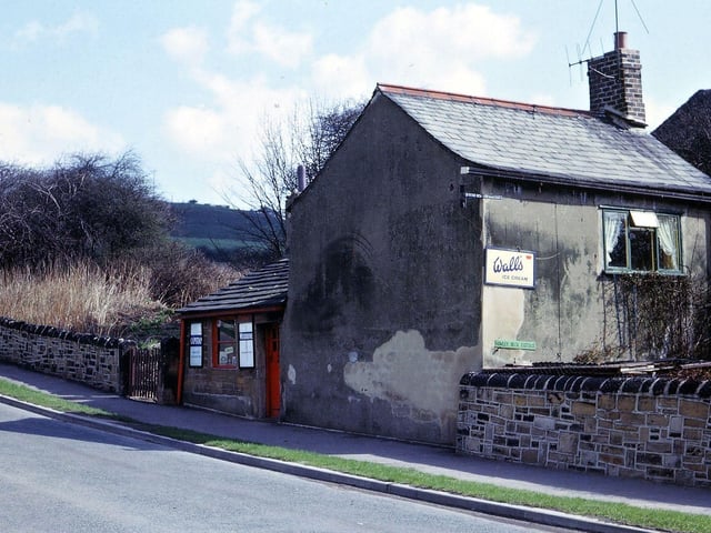Howley Beck Cottage at the bottom of Scotchman Lane lies beside the stream which formed the boundary between Morley and Batley when this picture was taken, and is now the border between Leeds and Kirklees. The cottage was used as a shop at this time especially for passing trade in ice cream, pop, cigarettes and sweets for people walking in the area.