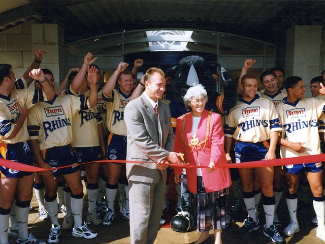 Councillor Linda Middleton, Lord Mayor of Leeds, and Leeds Rhinos head coach Dean Bell, open the Cookridge Hall Golf and Country Club on Cookridge Lane in September 1997, watched by Leeds Rhinos' players.