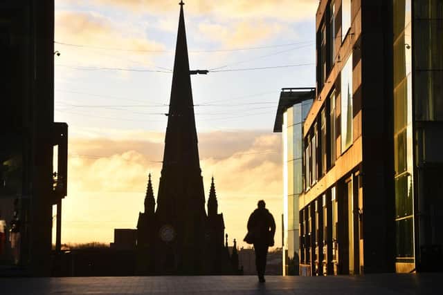 A man walks past St Martins Church in Birmingham as England enters its third coronavirus lockdown of the year (Photo: Nathan Stirk/Getty Images)