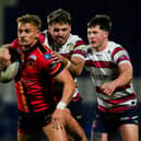 Luke Hooley, with ball, seen in action for Bradford Bulls against Oldham. Picture by Olly Hassell/SWpix.com.