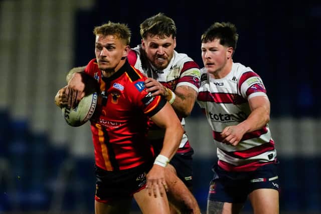 Luke Hooley, with ball, seen in action for Bradford Bulls against Oldham. Picture by Olly Hassell/SWpix.com.
