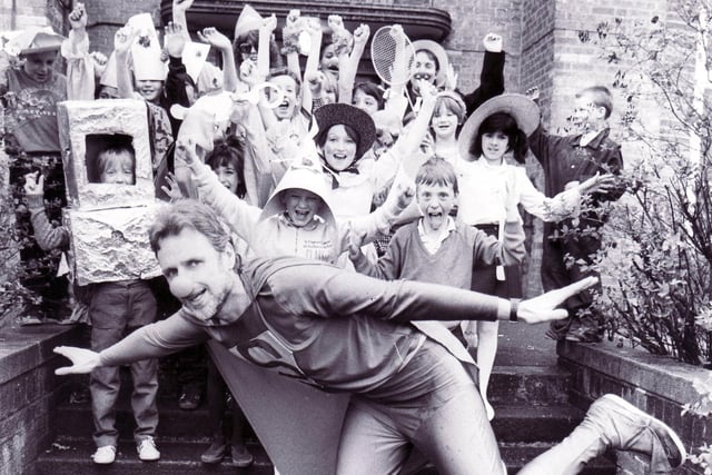 Woodthorpe Nursery, First and Middle Community School Headmaster, Dave Sandilands, 1989 dressed as Superman and much enjoyed by the dressed up pupils for Comic Relief on March 10