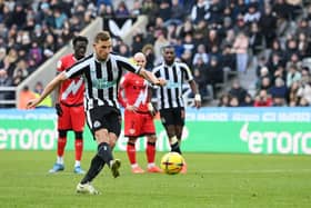 Chris Wood of Newcastle United scores their side's second goal from the penalty spot during the friendly match between Newcastle United and Rayo Vallecano at St James' Park on December 17, 2022 in Newcastle upon Tyne, England. (Photo by Stu Forster/Getty Images)