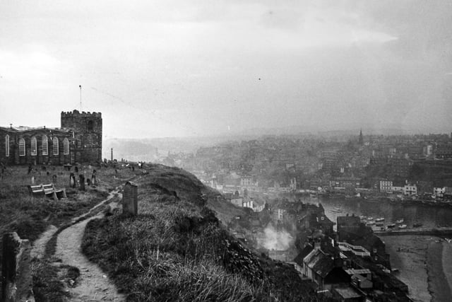 Whitby 'hazed by domestic chimney smoke and looking the cosier because of it' in December 1973.