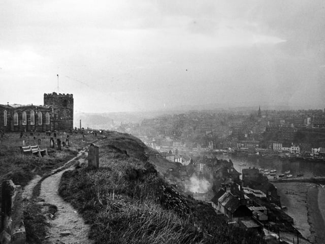 Whitby 'hazed by domestic chimney smoke and looking the cosier because of it' in December 1973.
