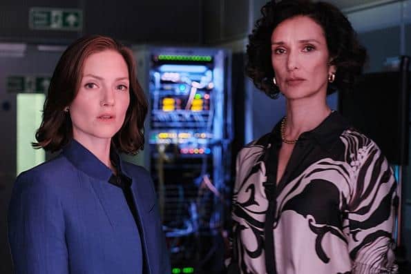 Commander Rachel Carey (Holliday Grainger) crosses swords with journalist Khadija Khan (Indira Varma) in the new series of The Capture, which airs on BBC1 on Sunday evenings (Picture: BBC/Universal International Studios/Laurence Cendrowicz)