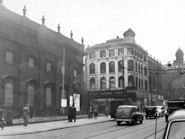 Boar Lane in March 1956 showing Holy Trinity Church and J. Jones, Furriers.
