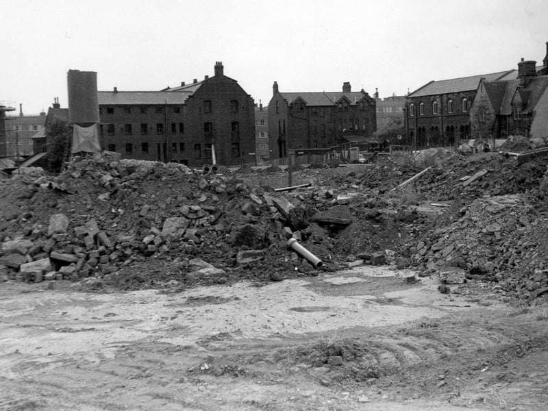 St. Patrick's Roman Catholic Church, partially seen, far left, and the Parochial Hall (with decorative gable). Right of centre is the convent and at the right edge St. Mary's Church Sunday School building. Building was to commence on the Agnes Stewart C of E High School on this site.