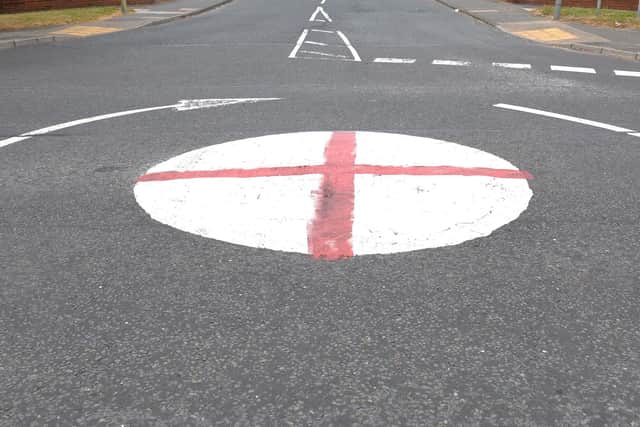 An England flag painted on a roundabout. North Yorkshire Council says while it respects individuals’ rights to fly and paint flags on their own private property, they must not do so on public property.