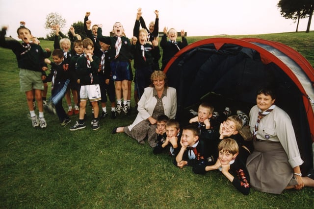 The 4th (Gildersome) Beavers Cubs and Scouts Group raise three cheers for Arncliffe Homes who have provided new outdoor kit for their camps in October 1999.