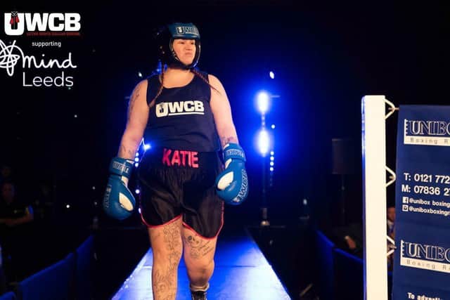 Katie, walking out to the ring at the glamourous final event