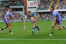 Cameron Smith seen scoring for Leeds Rhinos against Warrington Wolves in June. Picture by Steve Riding.