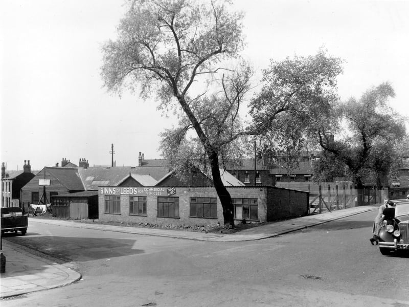 Laycock Place is on the left, in the centre is the junction with Savile Mount which is off to the right pictured in May 1958. The single storey brick garage is another depot for G.W. Binns of Leeds.