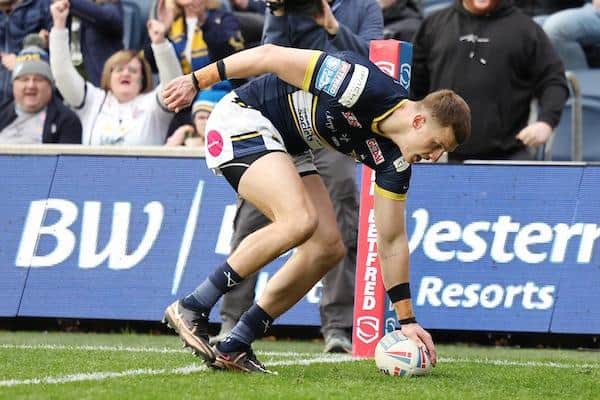 Ash Handley scores for Rhinos against Huddersfield this season. Picture by John Clifton/SWpix.com.