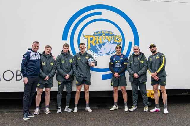 Leeds Rhinos MD Rob Oates is joined by players (left to right) Alfie Edgell, Max Simpson, Ash Handley, Chris Hankinson and Jack Bird alongside Sporting Director Ian Blease