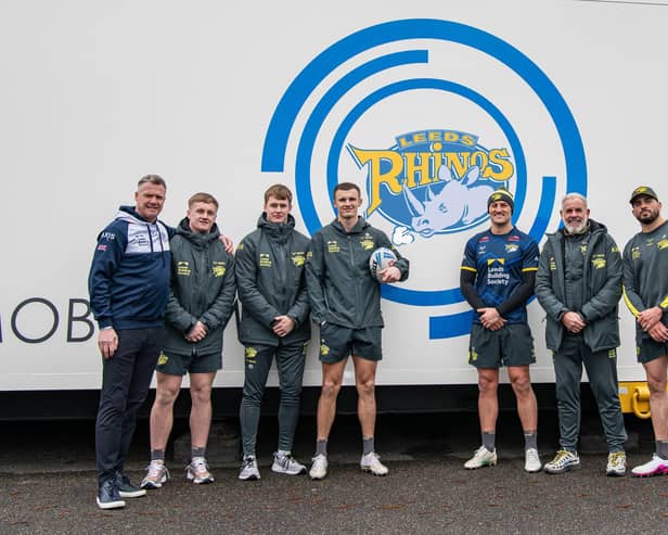 Leeds Rhinos MD Rob Oates is joined by players (left to right) Alfie Edgell, Max Simpson, Ash Handley, Chris Hankinson and Jack Bird alongside Sporting Director Ian Blease