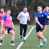 Cameron Smith gets a pass away during pre-season training with Rhinos. Picture by Simon Hulme.