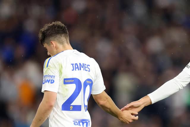LEEDS, ENGLAND - AUGUST 18: Ethan Ampadu of Leeds United interacts with teammate Daniel James during the Sky Bet Championship match between Leeds United and West Bromwich Albion at Elland Road on August 18, 2023 in Leeds, England. (Photo by George Wood/Getty Images)
