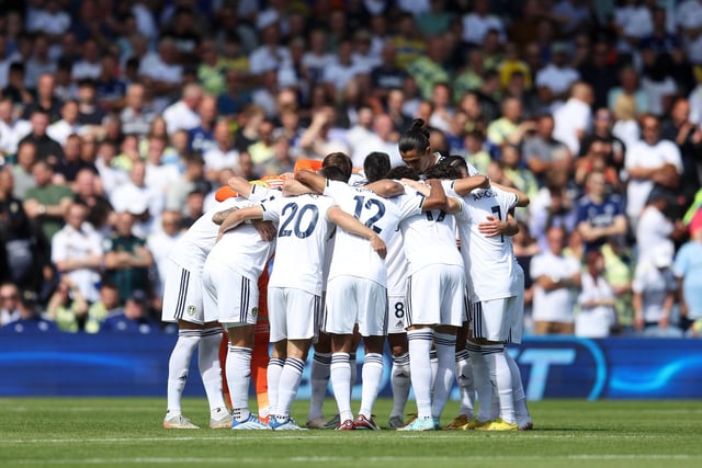 LEEDS, ENGLAND - AUGUST 21: Players of Leeds United huddle prior to kick off of the Premier League match between Leeds United and Chelsea FC at Elland Road on August 21, 2022 in Leeds, England. (Photo by Catherine Ivill/Getty Images)