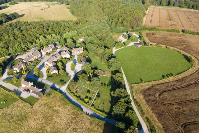 The village includes 900 square miles of turf, which is maintained by a full-time gardener, and as the show is filmed six weeks in advance of airing the production team ensures plants in the village are in flower at the correct time. In order to achieve this, bulbs are nurtured in greenhouses before being planted outside.. Pic: Rotor Aerial Photography/ITV Studios/PA Wire