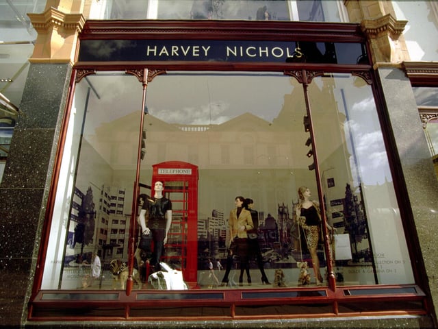 Window dressing at Harvey Nichols on Briggate. The backdrop is a London scene with St Paul's Cathedral and Westminster Abbey depicted.