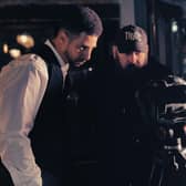 Director Nathan Geering plans shots for an action sequence with DoP Adam Hornsby and Actor Ethan Lindsay