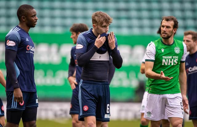 Jamie Hamilton walks off after being shown a straight red card for a foul on Martin Boyle
