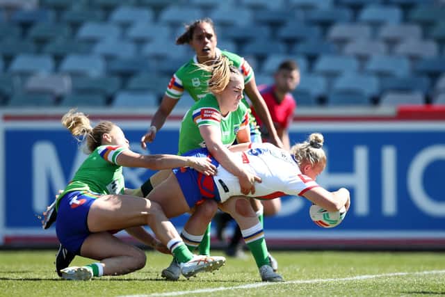 Georgia Roche scores for Newcastle Knights against Canberra Raiders during an NRLW clash in September. Picture by Jason McCawley/Getty Images.