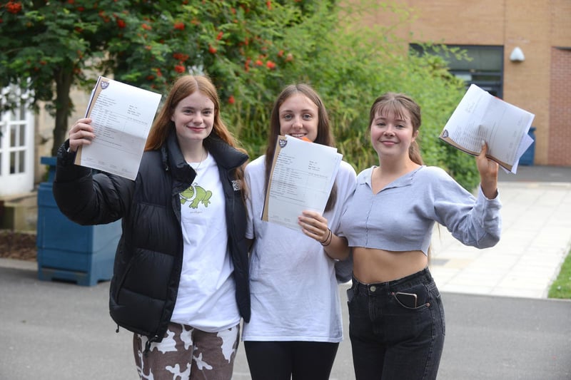(from left) Emelia Fishburn-Perkin, Louise Callan and Anna Rose Foster support each other on GCSE results day