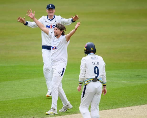 FINISHING TOUCHES: Yorkshire's Jack White celebrates dismissing Surrey's Josh Blake on the fourth day of the County Championship clash between the two teams at Headingley. Picture: Allan McKenzie/SWpix.com